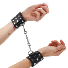 KINK - WRIST RESTRAINTS WITH SNAP FASTEN FULL OF RIVETS BLACK